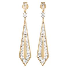 The perfect accompaniment to a special occasion outfit! These yellow gold ear sparklers feature a geometric profile with a trapezoid post dotted with three round diamonds in tapering sizes. The diamond trio in the trapezoid frame holds a round diamond in a four-prong setting. Dropping from it is an inverted kite-shaped dangler outlined with diamonds. Each earring measures 2.35" x 0.50" and weighs 8.6 grams. This pair of LB Exclusive 18K Yellow Gold 3.55ct Diamond Geometric Drop Earrings is offered in brand new condition inclusive of a gift box. Blue Gemstone Earrings, Occasion Outfit, Diamond Dangle Earrings, Special Occasion Outfits, Diamond Drops, Emerald Jewelry, Fine Jewellery Earrings, Hoop Earrings Small, Blue Gemstones