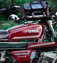 a red yamaha motorcycle parked in front of a forest