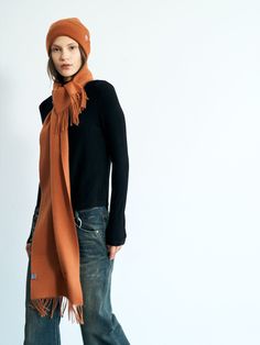 Lost Pattern's classic cashmere scarf in caramel serves as a statement piece that effortlessly enhances your everyday look, adding a dose of elegance and refinement. This ultra soft cashmere scarf is crafted with the utmost attention to detail, providing a luxurious feel and ensuring warmth and comfort during colder seasons.   Woven with 100% pure cashmere from Mongolia Heavenly soft, fringed ends on both sides Ripple effect on fabric from teasels gently hand brushed across the surface Dry clean Ripple Effect, Cold Season, Cashmere Wool, Mongolia, Cashmere Scarf, Independent Designers Fashion, Everyday Look, Lady In Red, What To Wear