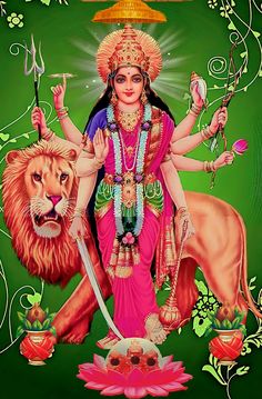 the hindu goddess sitting on top of a lion