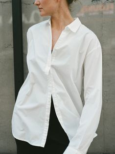 ~Description~ Aptly named, the Classic Button Down is the quintessential oversized, boyfriend fit button down. The Classic Button Down is crafted in lightweight washed linen with a soft hand and breathable feel and features a structured collar and cuff with oversized fit and curved hem. A perfect blouse to style alone or layered. Natural is a warm, undyed, unbleached linen white. ~End Description~ ~Details~ Lightweight European Linen 100% Linen Made in Lithuania ~End Details~ ~Fit Details~ Overs Perfect Blouse, Linen White, Fit Details, European Linens, Soft Hands, Boyfriend Fit, Soft Hand, Collar And Cuff, Lithuania