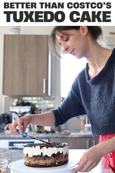 a woman cutting a cake on top of a white plate with the words, better than costco's tuxedo cake