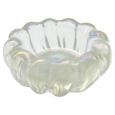 a clear glass bowl with an elephant design