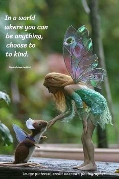 a little fairy holding the hand of a mouse in front of a quote from tinkerbell