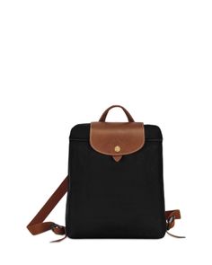 A timeless and durable nod to French style, Longchamp's nylon backpack stows everyday essentials for a tres-chic hands-free commute. Classic Black Backpack With Leather Handles, Le Pliage Medium, Longchamp Le Pliage Medium, Longchamp Backpack, Medium Backpack, French Designer, Tres Chic, Uk Travel, Longchamp Le Pliage