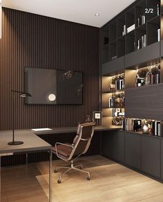 a room with a desk, chair and bookcases on the wall next to it