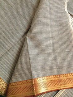 Grey Mangalagiri handloom Saree. The contrast of the quiet grey handloomed ground and the bright gold and red border blows my mind. Border Design Saree, Saris Indian, Khadi Sarees, Desi Wear, Dobby Weave, Simple Sarees, Ethnic Sarees, Red Border, Desi Style