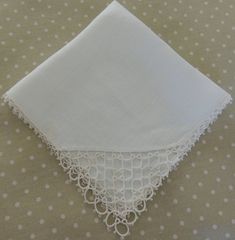 The perfect wedding accessory...a vintage handkerchief for luck and for catching happy tears! This midcentury linen hanky (just barely off-white, not ivory, just not icy white) features beautiful hand-stitched tatting decoration, including one lovely corner and tiny tatted work all around the edges. The hanky is in lovely vintage condition and will be the perfect memento, for either the bride or mother of the bride. The hanky is about 11.5 inches square. Please convo me with any questions. I pac Cheap White Retro Handkerchiefs, Classic White Wedding Handkerchiefs, Vintage Cream Handkerchiefs With Lace Trim, Vintage Handkerchiefs With Lace Trim For Gift, Vintage White Handkerchiefs With Lace Trim, Vintage Lace Trim Handkerchiefs As Gift, Vintage Wedding Handkerchiefs With Lace Trim, Vintage Lace Trim Handkerchiefs For Wedding, Vintage Handmade Wedding Handkerchiefs