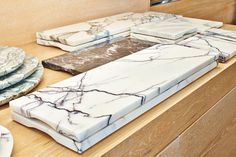 marble plates and napkins are on the counter