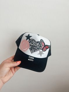 This custom made trucker patch hat is perfect for any occasion whether it be for spring/summer time, a lake hat, a gift for someone, or just a cute accessory to add a little spice to your outfit 🧢✨ DETAILS-  * This hat is one size with an adjustable SnapBack that is adjustable from 20in. - 23.5in. * The color of this hat is White * The material of the hat is polyester with iron on patches  REFUNDS AND CANCELLATIONS- Every hat is handmade by me as a result, a slight variation can occur from the picture with patch size or placement. If you have any problems with your hat please message me within 24 hours of receiving your order and I'd be happy to help! No refunds or exchanges will be accepted after. CONNECT- To enter giveaways, discount codes, or behind the scenes, follow our pages. 📲 Dia Trucker Patch Hat Ideas, Trendy Adjustable Hat With Embroidered Patch, Trendy Baseball Cap With Embroidered Patch And Curved Brim, White Patches Trucker Hat, Trendy Baseball Cap With Embroidered Patch, Trendy Baseball Cap With Patches And Curved Brim, Black Baseball Cap With Patches, Trendy Baseball Cap With Patches, Trendy Trucker Hat With Patches