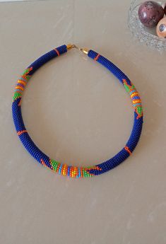 Beaded Necklace | African Jewelry | African Maasai Beaded Necklace | Statement Necklace | Ethnic Jewelry | Gift For Her | Dark Blue Necklace This statement necklace is made from fine beads. Main Color - Dark Blue. Available in different colors. Feel free to send me a convo or e-mail for any clarification or more information. Thank you for visiting, Maasai Jewelry, Seashell Bracelet, Beaded Braclets, Cowrie Shell Necklace, Necklace African, Blue Beaded Necklace, Summer Bracelets, Shell Bracelet, Maasai