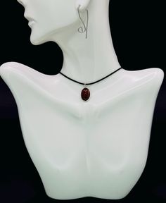 Looking for the perfect accessory to add style and meaning to your jewelry collection? Discover our Carnelian Y2K Necklace, a stunning piece that combines retro charm with contemporary flair. Our Protection Necklace features a vibrant Carnelian stone, known for its energizing and protective properties. The Black Cord Necklace design ensures versatility and comfort, while its Waterproof nature makes it ideal for everyday wear. Crafted with care, this necklace makes a thoughtful Sister Gift or a G Amber Crystal Necklace For Gift, Minimalist Adjustable Oval Necklaces, Minimalist Amber Round Pendant Jewelry, Adjustable Gemstone Necklace With Oval Pendant, Adjustable Oval Pendant Gemstone Necklace, Black Sterling Silver Choker For Gift, Black Sterling Silver Choker As Gift, Adjustable Oval Necklace Perfect For Gifts, Adjustable Oval Necklace As Gift