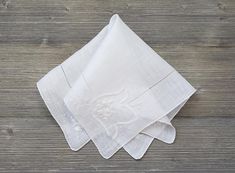 10% Off 2 or More Code SAVE10 Vintage Wedding Handkerchief ~ This all white hankie features embroidered flowers, appliqué and drawn-thread details. The needlework is exceptional.  It is made of soft cotton and has a rolled hem. A perfect 'something old' something beautiful for the bride!  Measures 12 x 12 inches Thanks for visiting → RoseAnaDana.Etsy.com . More Code, Drawn Thread, Wedding Handkerchief, Something Old, Rolled Hem, Something Beautiful, All White, Embroidered Flowers, Vintage Wedding