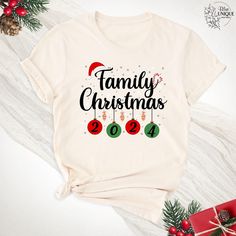 Christmas 2024 Family Tshirts, Christmas Crew Shirt, Matching Christmas Family Tee, Christmas Party Shirt, Holiday Family Christmas Gift Tee. The Christmas 2024 Family Tshirts are perfect for bringing festive cheer to your holiday celebrations. These "Christmas Crew Shirts" are ideal for creating a coordinated look, making your gatherings even more special. The "Matching Christmas Family Tees" are great for family photos, parties, or as a thoughtful "Holiday Family Christmas Gift Tee." Celebrate Christmas T Shirt Ideas, Christmas Crew Shirts, Matching Christmas Family, 2024 Family, Santa Tee, Merry Christmas Family, Christmas Party Shirt, Christmas Party Shirts, New Years Shirts