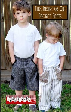 two young boys standing next to each other in front of a fence with the words inside or out pocket pants