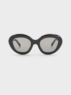 Turn on the sass with these cateye sunglasses. The timeless style has been emboldened with thicker frames, which maximise the lifting effect they have on the face. With their classic black finish, this versatile pair will complement a wide range of outfits and styles. Made out of recycled acetate and cupronickel, they are better for the environment and sturdy at the same time. Belt Ring, Cateye Sunglasses, Charles Keith, Of Outfits, Kids Sale, Sunglasses & Glasses, Belt Size, Sales Gifts, Cat Eye Sunglasses