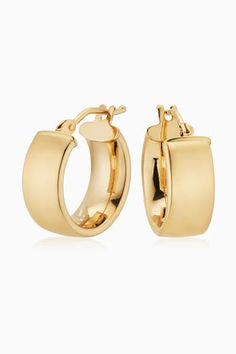 The One Large Hoops are easy to love. With a sleek design, and bolder look, these hoops will add polished shine to any ear stack or stand out solo as your go-to statement earrings. Metal: 14k Yellow Gold Dimensions: 6mm Tube, 20mm Inner Diameter Weight: 2.4 Grams Origin: Crafted in Arezzo, Italy Arezzo Italy, Ear Stack, Earrings Metal, Easy To Love, Gold Hoops, Statement Earrings, Sleek Design, The One, Jewelry Earrings