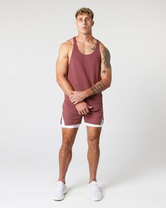 HIGHLIGHTS. Signature heavy cotton fabric blend. Lower chest drop front neckline. Scoop hemline. Racer back style. Reinforced binding arm and neckline finishing. Alphalete Core wordmark on center front. Lower rib cage drop armhole FIT SUGGESTION. This item runs true to Alphalete’s standard fit.. If you are between sizes, we recommend sizing up for a relaxed fit.. Model.  is 6’5”/195.6cm, wearing a size XL with a 45”/115cm chest.. MATERIALS AND WASHING DIRECTIONS. 100% Cotton. We recommend washin Cotton Scoop Neck Gym Top, Cotton Scoop Neck Top For Gym, Cotton Top With Dropped Armholes For Workout, Neckline Finishing, Cotton Core, Money Sign, Hip Hip, Sleeveless T Shirt, Ombre Effect