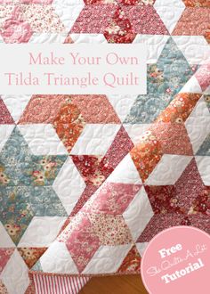 a close up of a quilt with the words make your own tila triangle quilt