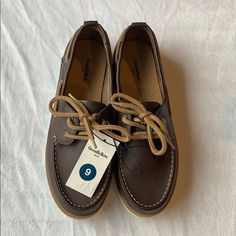 Top Off A Variety Of Casual Outfits With The Rice Boat Shoes From Goodfellow & Co. Featuring A Traditional And Timeless Design, These Slip-On Boat Shoes Will Bring Extra Style To Your Look While Keeping Your Feet Comfortable With The Cotton Insole And Fabric Upper. Pair Them With Khaki Chino Shorts And A Button Down For A Go-To Outfit That's Both Smart And Laid-Back. Casual Brown Low-top Boat Shoes, Boat Shoe, Khaki Chinos, Chino Shorts, Boat Shoes, Timeless Design, Shoes Mens, Men's Shoes, Rice