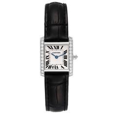 Cartier Tank Francaise White Gold Diamond Ladies Watch WE100251. Quartz movement. Rectangular 18k white gold 20.0 x 25.0 mm case. Octagonal  crown set with an original Cartier factory diamond. Original Cartier factory diamond bezel. Scratch resistant sapphire crystal. Silver dial with black radial Roman numerals. Sword shaped blued steel hands. Secret Cartier signature at VII. Black leather strap with 18k white gold deployant buckle. Cartier Black Watch, Cartier Black Rectangular Watch, Cartier Womens Watch, Cartier White Gold, Vintage Cartier Watch, Cartier Silver, Black And White Jewelry, Cartier Watches Women, Dainty Fine Jewelry