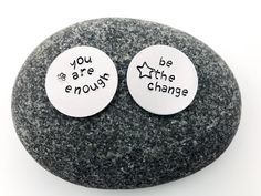 two buttons that say you got this on some kind of rock with the words, be you