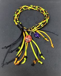 For that creepy person in your life who loves all things Halloween, this hand-braided bracelet will add some fun to their October. It features bone pumpkins, ceramic skulls, and glass beaded fringe on a spooky band of green, orange, and black silk cording. Check out the similarly made anklet in my store for double the fun...Trick-or-Treat!! Creepy Person, Kumihimo Bracelets, Braided Bracelet, Beaded Fringe, Braided Bracelets, Green Orange, Black Silk, Arm Band, Trick Or Treat