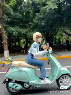 a person on a motor scooter with a mask and glasses riding down the street