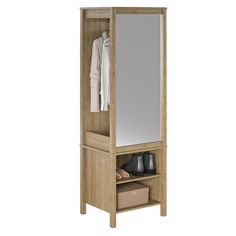 a wooden cabinet with mirror and shoes on it