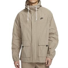 Nike Club Bowline Jacket 'Khaki' FN3109-247 Spring Military Windbreaker For Outdoor Activities, Spring Military Style Windbreaker For Outdoor Activities, Military Style Windbreaker For Spring Outdoor Activities, Military Style Spring Windbreaker For Outdoor, Khaki Fall Hiking Outerwear, Spring Khaki Parka For Outdoor Activities, Khaki Outerwear For Fall Hiking, Fall Hiking Khaki Outerwear, Sporty Brown Outerwear For Spring