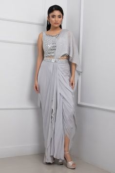 Grey pre-draped saree featuring mirrorwork embellished waistband and bead embellished pallu. Comes with mirrorwork, sequin and bead embellished padded blouse. - Aza Fashions Pre-draped Side Open Saree For Party, Party Pre-draped Saree With Cape Sleeves, Party Wear Draped Dress With Mirror Work, Festive Pre-draped Saree With Side Open And Draped Sleeves, Evening Georgette Pre-draped Saree With Mirror Work, Evening Draped Blouse Piece With Mirror Work, Pre-draped Saree With Mirror Work For Reception, Silk Dresses With Mirror Work And Draped Shape, Formal Pre-draped Saree With Sheer Dupatta