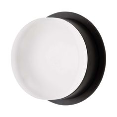 a black and white round light fixture