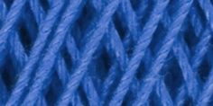 blue yarn is spooled on top of each other in this close up photo