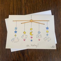 "Oh, baby! This handmade card is perfect for the mom to be! Great for a baby shower or sprinkle! Gender neutral but can be customized, please message.  It features a hand drawn pen and watercolor design.  The card is 5\" by 7\" and is blank inside with a graphic in the bottom right corner.  Comes with a white envelope and clear plastic sleeve to protect the card.  Note: Each card is handmade and unique, there may be differences in separate cards of the same design.  Paper: 140 lb. / 300 gsm high quality cold press watercolor paper Size: 5\" by 7\"" Baby Shower Cards Handmade, Happy Birthday Cards Handmade, Welcome Baby Cards, Baby Congratulations Card, Baby Cards Handmade, Card Design Handmade, Baby Boy Cards, Hand Drawn Cards, Watercolor Baby Shower