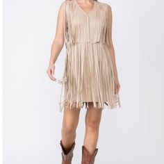 Part Of Our Nashville Nights Collection! Kick The Dust Up In This Mid-Thigh Length Suede Fringe Dress. With Her Tiered Fringe Styling She's A Head Turner! Wear With A Pair Of Your Favorite Cowgirl Boots And Top It Off With A Cowboy Hat! Sleeveless Fringe Mini Dress For Spring, Beige Sleeveless Fringe Dress, Spring Beige Fringe Dress, Spring Beige Fringe Mini Dress, Fringe Styling, Suede Fringe Dress, Stretchy Bodycon Dress, Cute Black Dress, Tie Dye Mini Dress