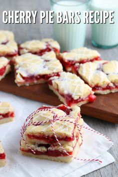 strawberry shortbreads with cream cheese filling on a cutting board