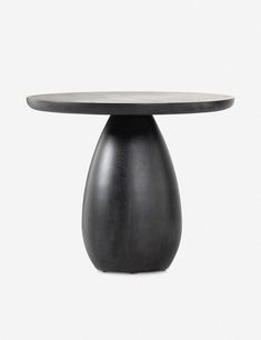 a round table with a black base