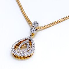 This 18k yellow gold pendant set, weighing 8.3 grams, features a dainty open drop design adorned with 1.14 carats of round brilliant cut diamonds. The diamonds, with an F-G color and VS clarity, add exceptional brilliance and elegance. The pendant measures 1 inch in length, while the matching earrings are 1.1 inches long and come with secure screw back posts. Ideal for those who appreciate luxurious and sophisticated jewelry, this set adds a touch of refined charm to any collection. Its exquisit Gold Teardrop Pendant Diamond Necklace With Single Cut Diamonds, Gold Diamond Teardrop Pendant Necklace, Hallmarked Diamond Pendant Necklace, Formal Yellow Gold Teardrop Diamond Necklace, Dazzling Diamond Teardrop Pendant Necklace, Gold Teardrop Diamond Necklace With Vvs Clarity, Gold Diamond Necklace With Single Cut Teardrop Diamonds, Exquisite Teardrop Diamond Necklace, Formal Yellow Gold Teardrop Pendant Diamond Necklace