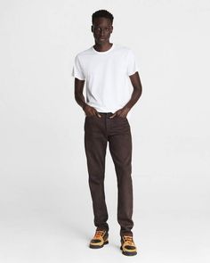 The Fit 2 - most loved. For good reason. This time made from an Italian selvedge-inspired denim with an optimal, shape-holding touch of comfort stretch. Burnt brown is a stealthy, overdyed brown wash. Zip fly. rag & bone Men's Slim Fit Brown Authentic Stretch Jeans | Burnt Brown, 28X32 Distressed Brown Cotton Jeans, Straight Stitch Embroidery, Brown Washed Cotton Jeans, Non-stretch Brown Cotton Jeans, Brown Non-stretch Denim Jeans, Affordable Brown Men's T-shirt, Raw Denim, Straight Stitch, Slim Fit Men