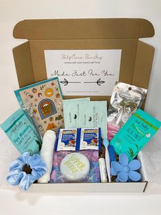 a box filled with lots of goodies for someone's special occasion or baby shower