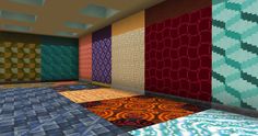 a room filled with lots of colorful rugs on top of each other and walls painted in different colors