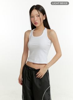 Product Detail Style : Street, Athleisure Detail : Cut out, Strap Print : Solid Material : Cotton Sleeve : Tank top Neck : Halter neck Length : Crop Cotton100 Color : Black, Light beige Model Size Model is wearing size S/M and the color Black. Height : 5'5" | 166cm / Top : S / Bottom : S (25 inch) .prddescription table, .prddescription td, .prddescription th { border : 1px solid black; border-collapse : collapse; padding: 10px; } Size(Inch) Size Shoulder Bust Armhole Hem Total Length S/M 6.3" 24 Basic Racerback Top For Streetwear, Casual Racerback Tank Top For Streetwear, Basic Crop Top For Summer Gym, Casual Stretch Racerback Top, Basic Crop Top For Gym In Summer, Basic Summer Crop Top For Gym, Casual Sleeveless Crop Top For Sports, Basic Summer Gym Crop Top, Casual Sleeveless Sports Crop Top