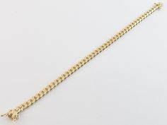 "Here is a Solid 14k Gold Miami Cuban link men's bracelet!! * Metal purity : 14K gold , Stamped, Not plated. * Width: little over 1/4\" or 6.00 mm wide * Weight and avg length * 8\"= 24 grams , 8 1/2\"= 25.2 grams * Closure: Slide clasp with safety latches * Complimentary Gift Box This Bracelet is maid in USA and Cuban is the name of the style. Images may be enlarges to show details.Please pay attention to the photos and read description before the purchase. I ask you earnestly to make sure abou Classic Gold Cuban Link Bracelet For Anniversary, Classic Cuban Link Bracelet With Curb Chain For Anniversary, Classic Cuban Link Diamond Bracelet, Classic 14k Gold Cuban Link Bracelet With Polished Finish, Miami Cuban Link, Bracelet Metal, Miami Cuban, Men's Bracelet, Cuban Link