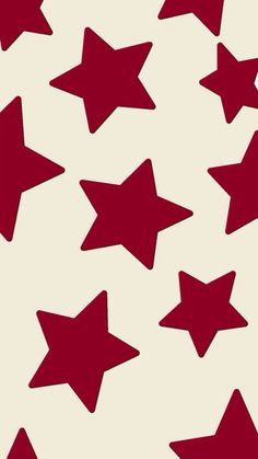 many red stars are arranged on a white background