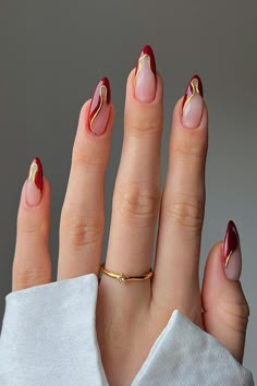 🍂 Get ready to transform your nails with our 30 Creative October Nail Ideas for 2024: Festive and Fall-Inspired Designs! Think pumpkin spice, rich burgundies, and playful Halloween motifs. Whether you’re into detailed nail art or prefer a chic, minimalist look, our collection has you covered. Perfect for adding a touch of seasonal flair to your style, these designs will keep your nails looking fabulous all month long. 🍁 #OctoberNails #FallNailDesigns #FestiveNails #2024NailTrends Almond Nails Red And Gold, Elegant Red And Gold Nails, Metallic Almond Nails Designs, Nails Prom Red Dress, Red Gold Almond Nails, Red Nails Unique, Sculpted Gel Nail Designs, Red Modern Nails, Ruby Inspired Nails