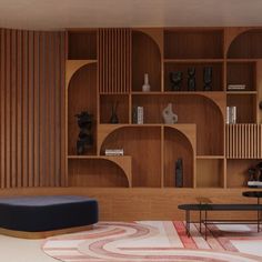 a living room filled with lots of wooden shelves next to a coffee table and ottoman