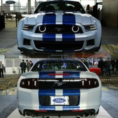 two pictures of the front and side of a white mustang with blue stripes on it