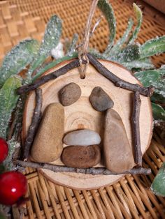 an ornament made out of wood and rocks