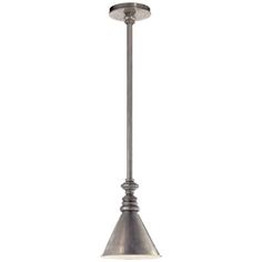 a light fixture hanging from the ceiling in an industrial style with a metal cone and glass shade