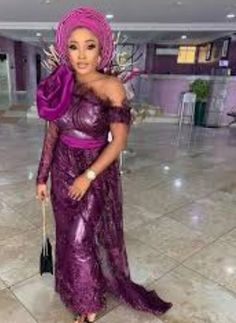 This elegant African women's outfit is specially designed to make you look unique among others in all occasion. our cloths are made with quality fabric, great sewing, neat finishing and the price is affordable. The cloths are of different colors you can choose any color of your choice. Please contact us to make you look unique in all event. Lace Asoebi, Big Roses, Wedding Reception Outfit, Latest Aso Ebi Styles, African Party Dresses, African Wedding Attire, African Lace Styles